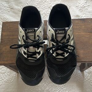 Size 9 women’s white and black volleyball shoes. Good condition.